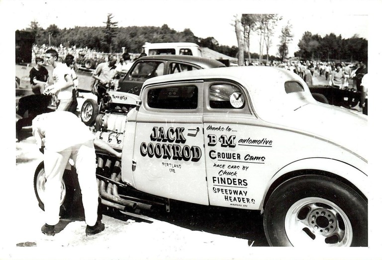 Chuck Finders wrenching on Jack's Car